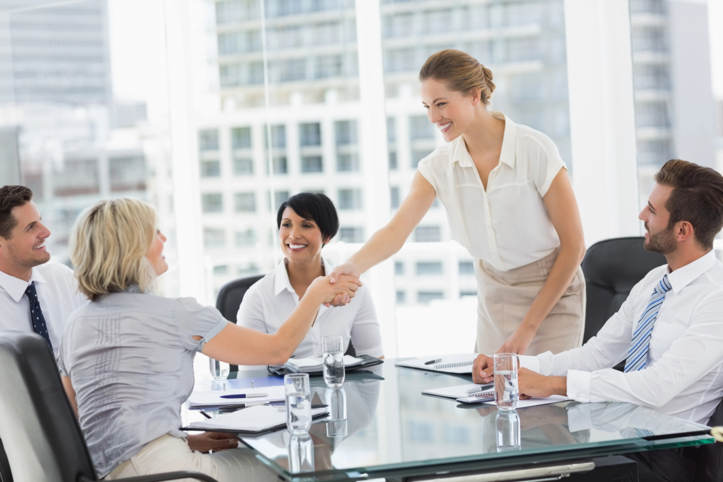 Executives Shaking Hands During Meeting